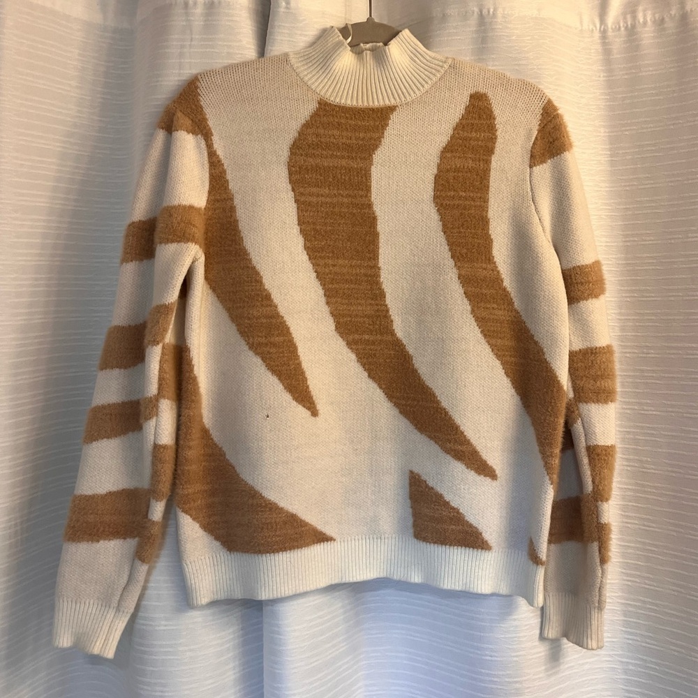 Tan and White Turtleneck Sweater with Artistic Pattern